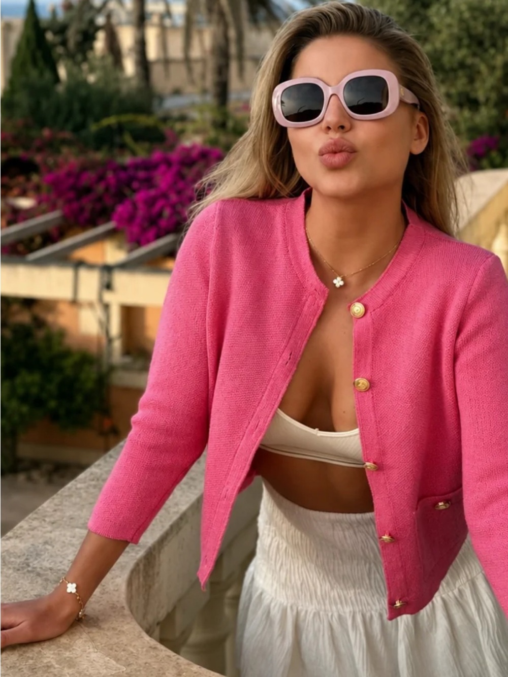 Absolutely gorgeous pink knit cardigan with long sleeves,golden buttons,pockets.